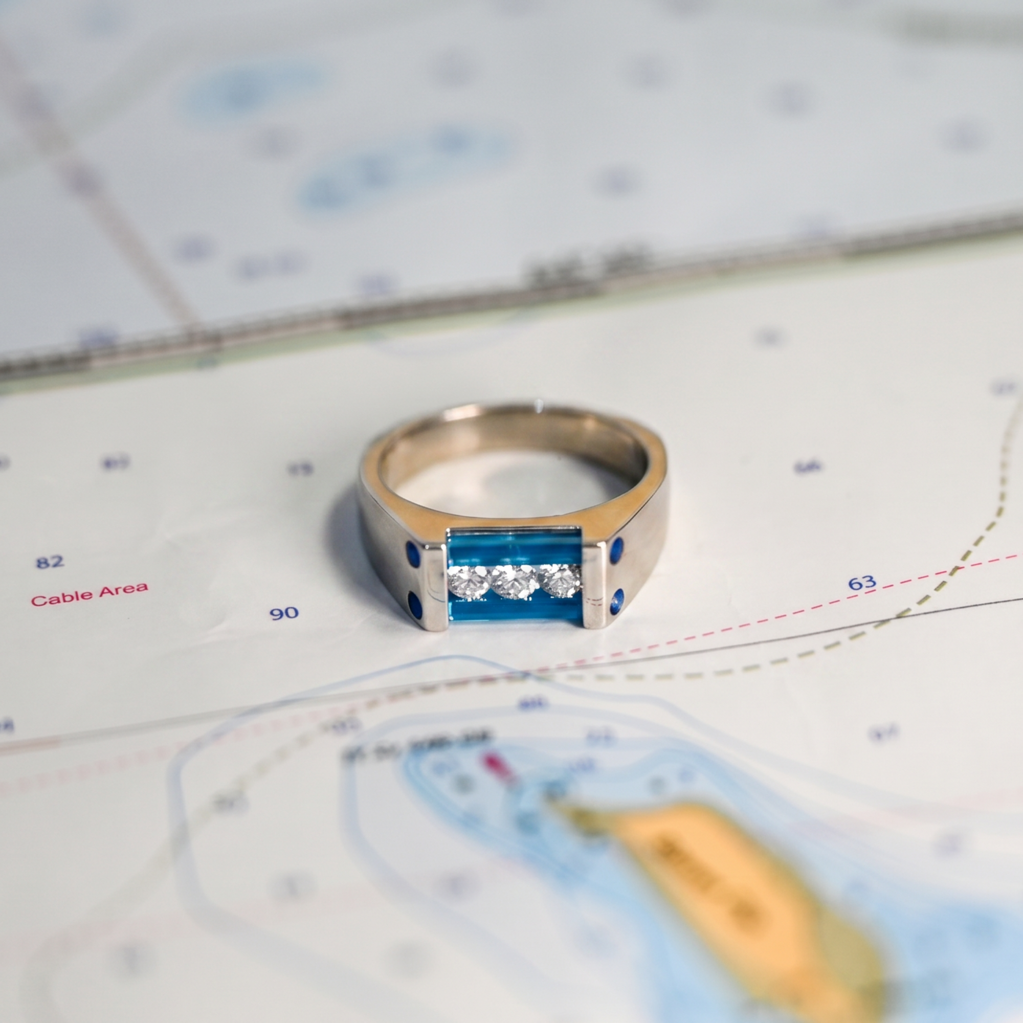 3 Diamonds .18ctw, AAA Petrol Blue Onyx Cylettes Capture Ring in Platinum