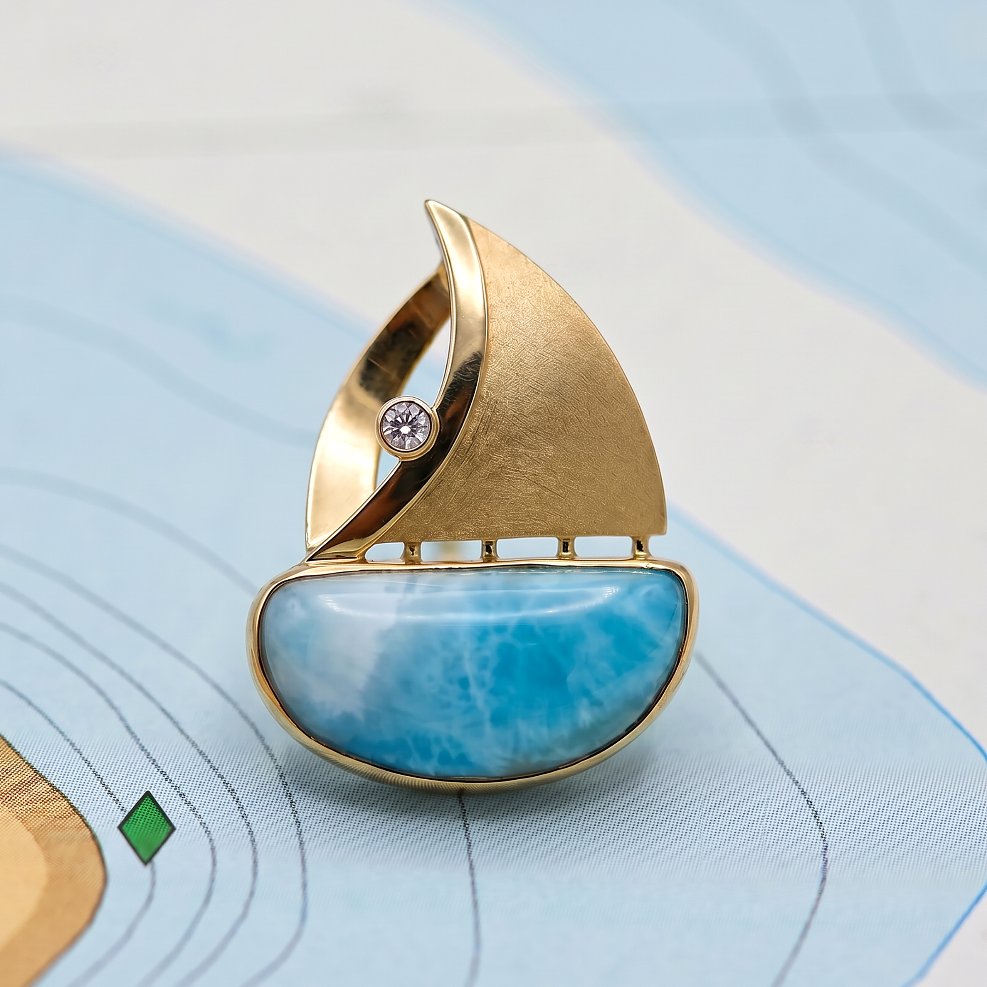 14KYG LARIMAR W/DIAMOND .06CT SAILBOAT PENDANT