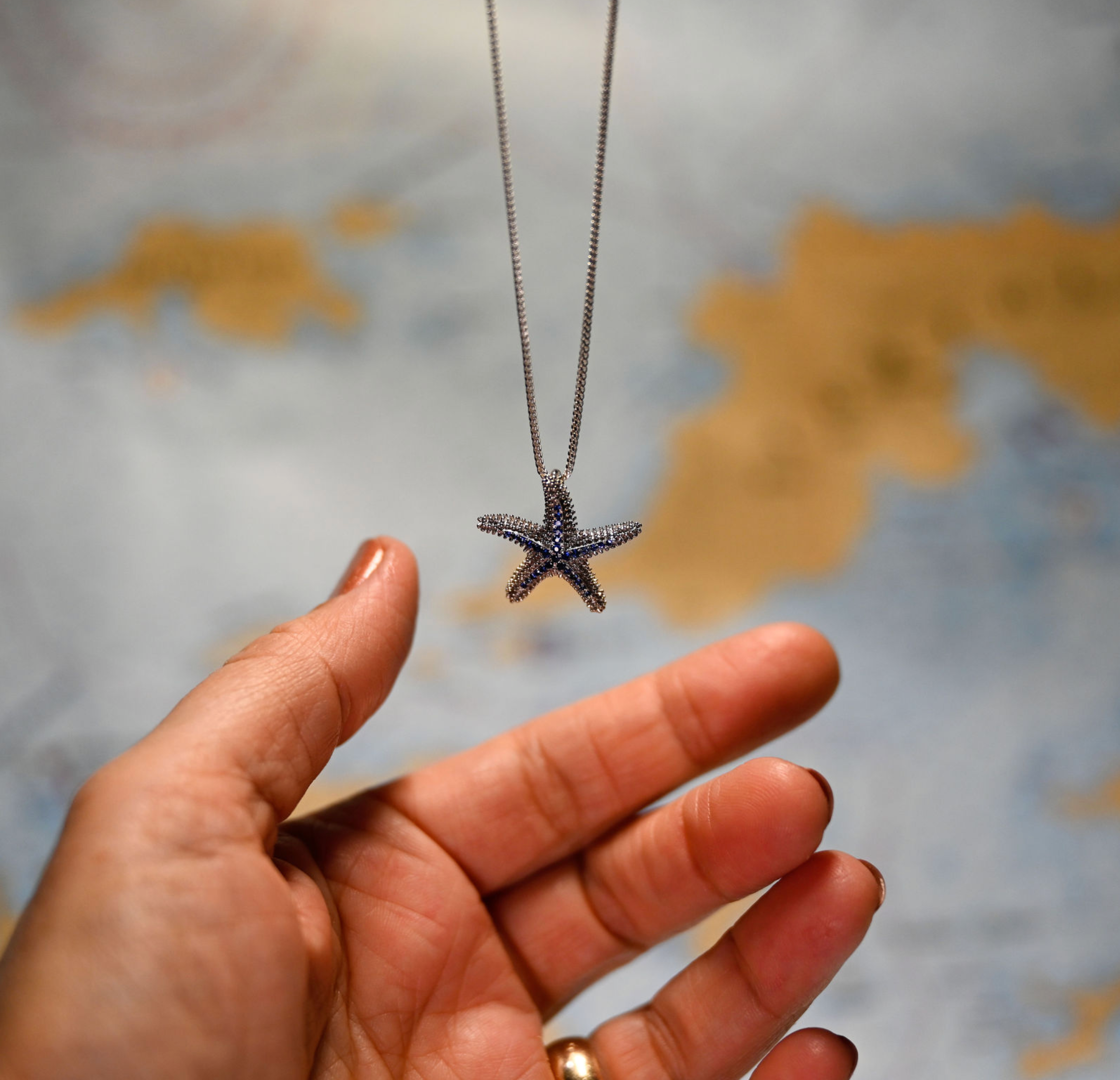 Precious Silver 22mm Starfish w/33 blue sapphires