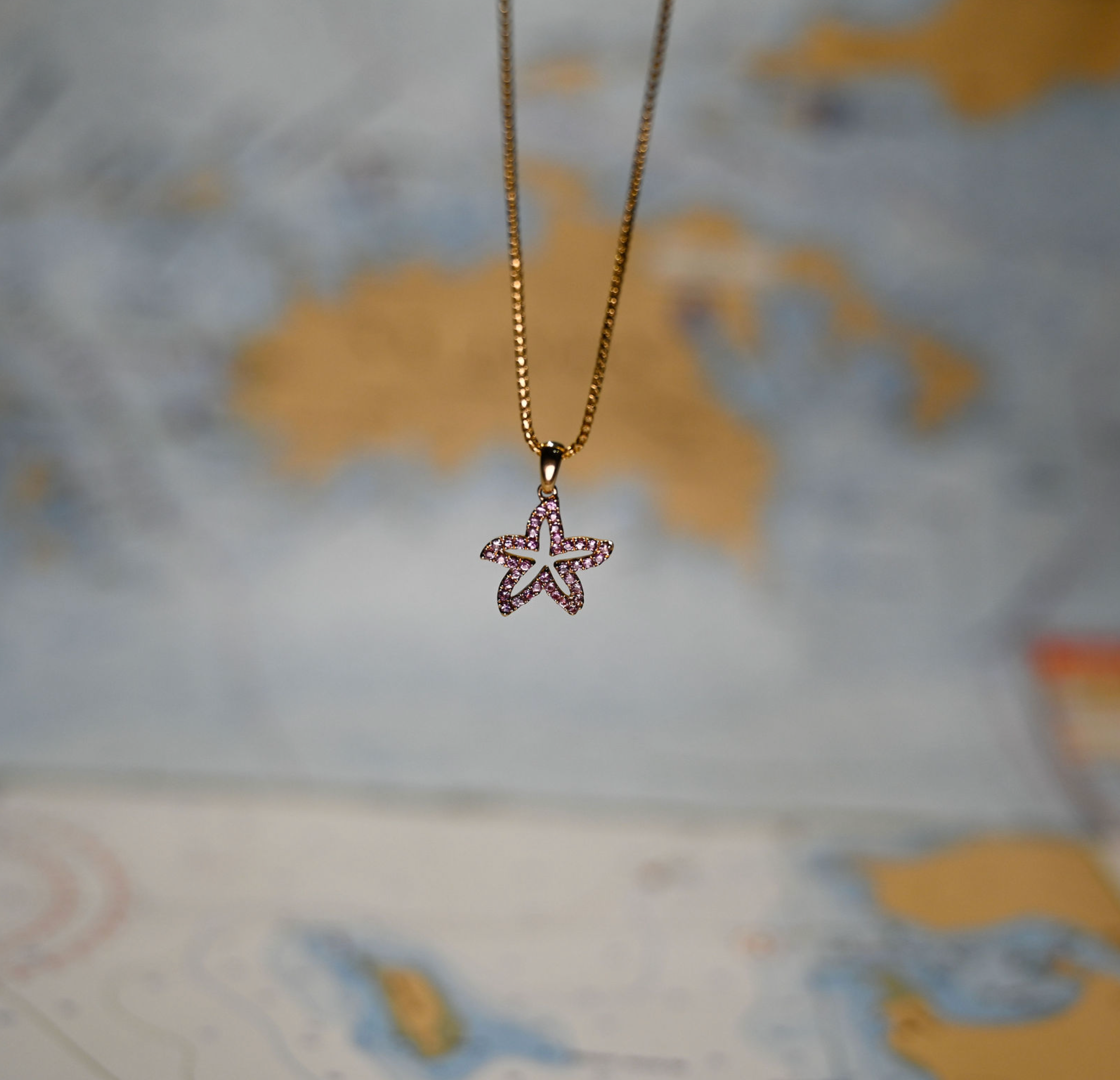 14kyg Starfish Pendant with 39 Pink Sapphires