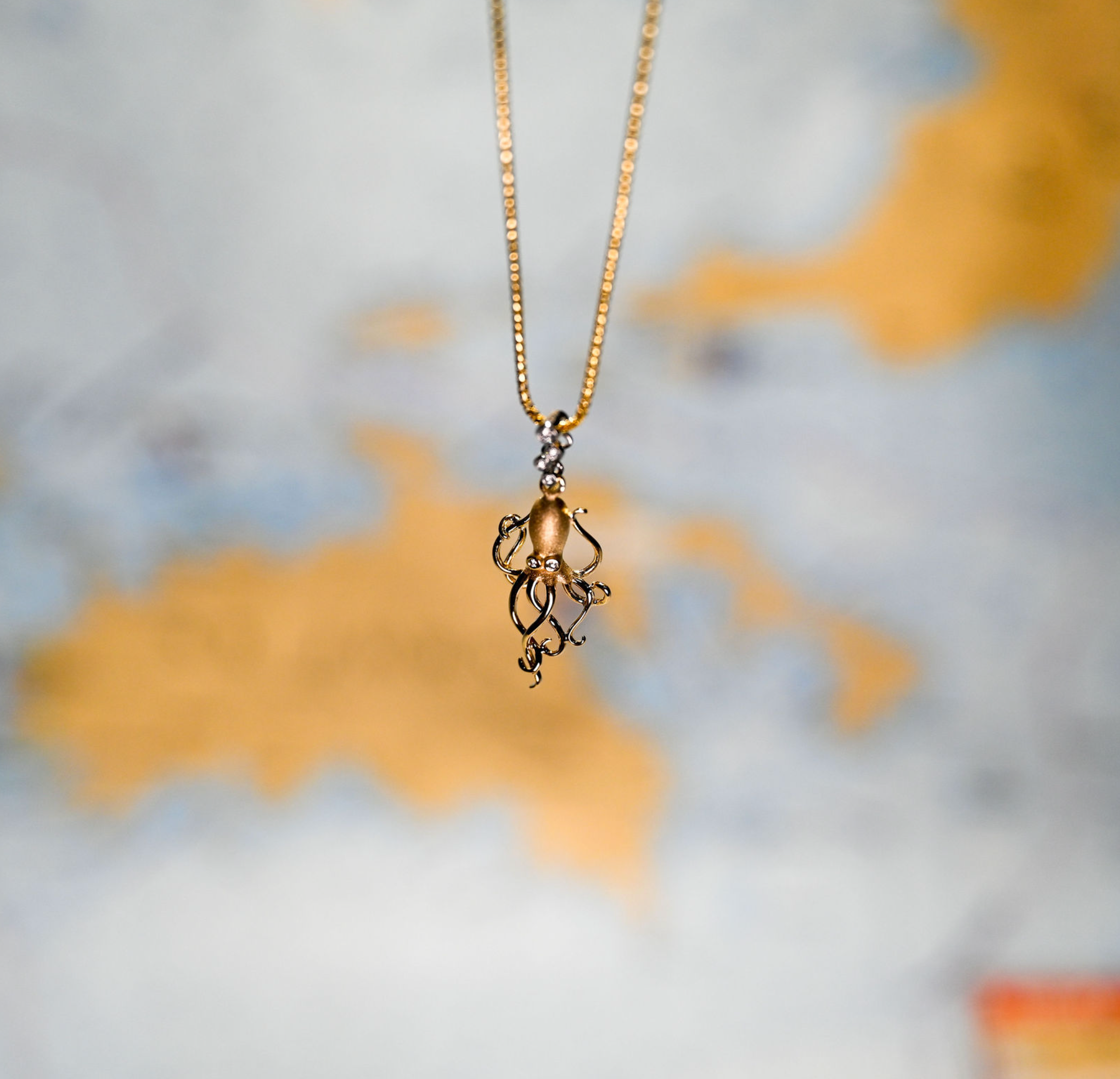 14k 2-Tone Octopus Pendant w/6 diamonds (.06cttw)