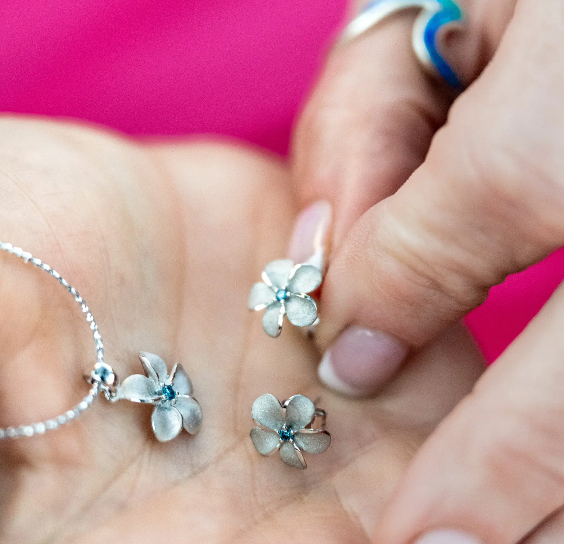 14kwg 11mm Plumeria Pendant w/blue diamonds (.02cttw)