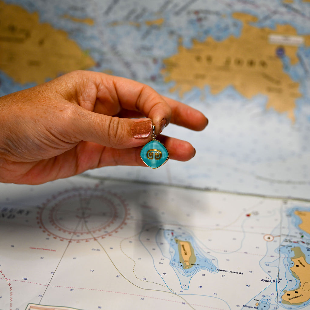 18kyg 16mm Reversible St John Island/Petroglyph Pendant w/Turquoise,24k gold leaf, quartz crystal