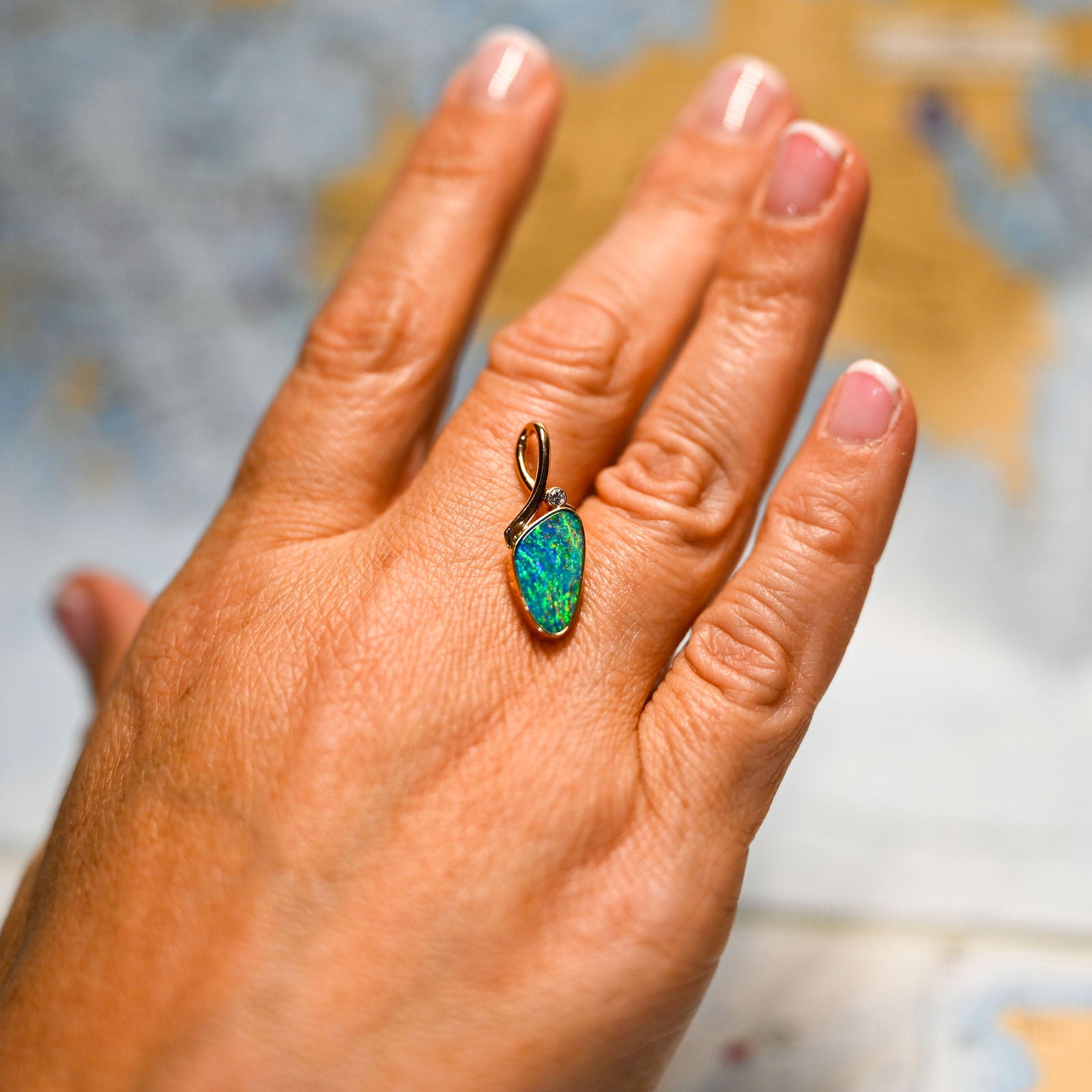 14KYG OPAL DBLT 15X8 DIA .03C PENDANT