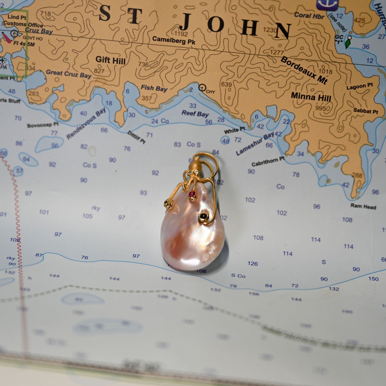 14kyg Octopus Pendant with 2 diamonds (.01cttw) color sapphires