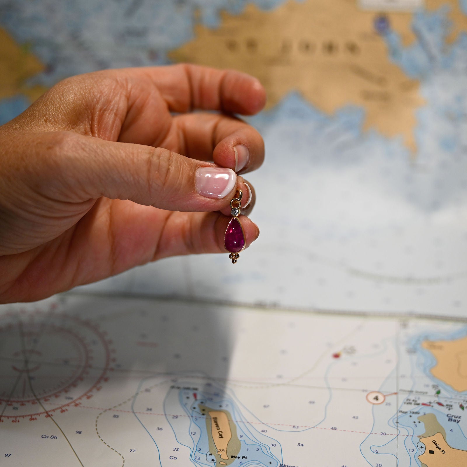 14KYG RUBY 12.4X7.1 2.92 C/DIA .05C PENDANT