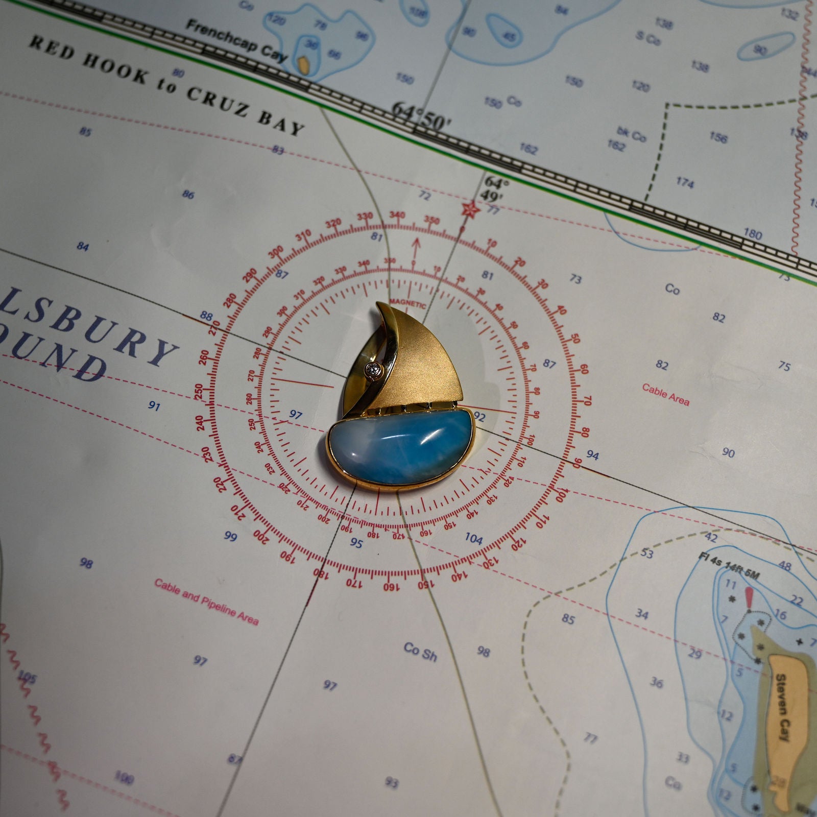 14KYG LARIMAR W/DIAMOND .06CT SAILBOAT PENDANT